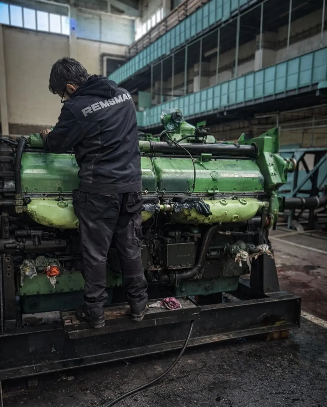 REMSMAR engineer servicing a MWM marine engine